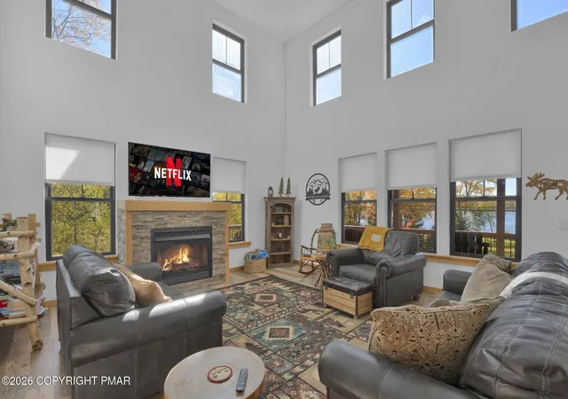Photo 3 of Single family home for sale at 7669 Lake Shore Dr, Pocono Lake, PA 18347 | MLS# PM-145652 | Listing updated on 2026-10-16