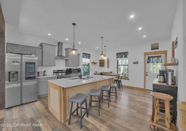 Photo 3 of Single family home for sale at 7669 Lake Shore Dr, Pocono Lake, PA 18347 | MLS# PM-145652 | Listing updated on 2026-10-16