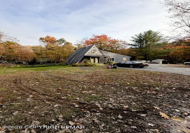 Photo 3 of Single family home for sale at 214 Cross St, Pocono Lake, PA 18347 | MLS# PM-145602 | Listing updated on 2026-10-21