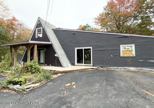 Photo 3 of Single family home for sale at 214 Cross St, Pocono Lake, PA 18347 | MLS# PM-145602 | Listing updated on 2026-10-21