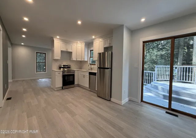 Photo 3 of Single family home for sale at 1127 Thunder Dr, Pocono Summit, PA 18346 | MLS# PM-145604 | Listing updated on 2026-10-19