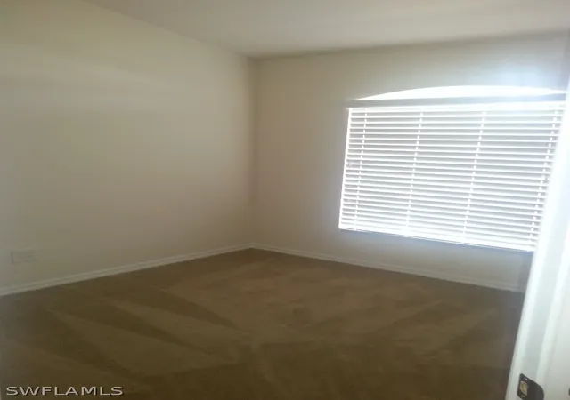 Photo 2 of Single family home for sale at 1825 Tomaso Ave, Lehigh Acres, FL 33972 | MLS# 222049141 | Listing updated on 2026-10-14