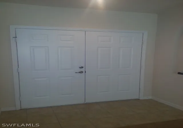 Photo 3 of Single family home for sale at 1825 Tomaso Ave, Lehigh Acres, FL 33972 | MLS# 222049141 | Listing updated on 2026-10-14