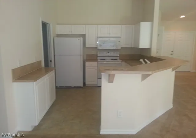 Photo 4 of Single family home for sale at 1825 Tomaso Ave, Lehigh Acres, FL 33972 | MLS# 222049141 | Listing updated on 2026-10-14