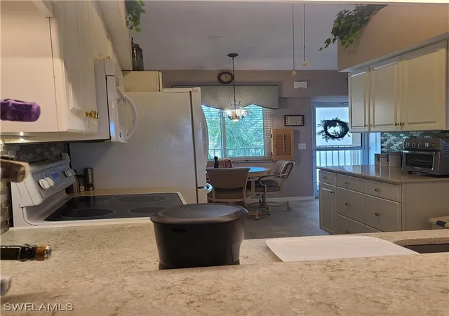 Listing Photo 5 - Condo for sale in building located at 20151 Ian Ct, Estero, FL 33928 - Unit #309