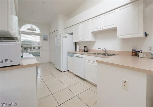 Listing Photo 5 - Condo for sale in building located at 4925 Sandra Bay Dr, Naples, FL 34109 - Unit #201