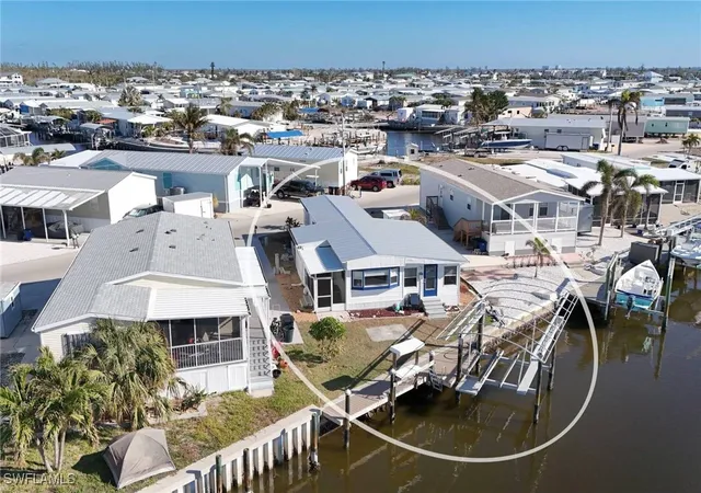 Photo 3 of Manufactured home for sale at 3893 Dewberry Ln, Saint James City, FL 33956 | MLS# 224105420 | Listing updated on 2026-09-24