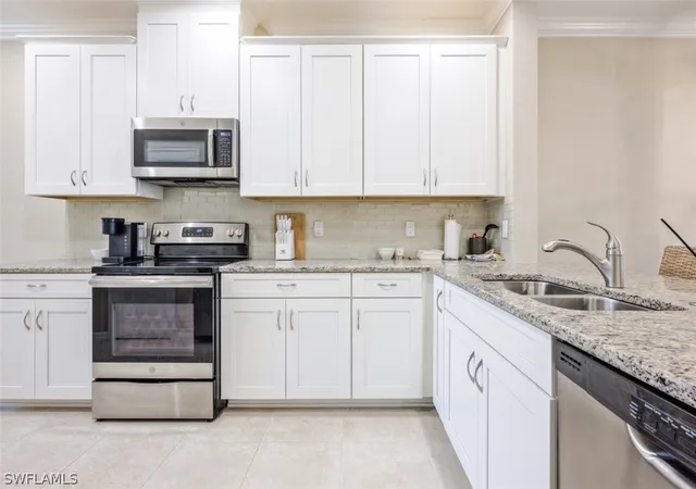 Listing Photo 4 - Condo for sale in building located at 9374 Pocida Ct, Naples, FL 34119 - Unit #102