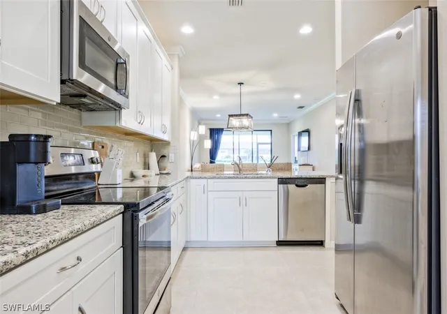 Listing Photo 5 - Condo for sale in building located at 9374 Pocida Ct, Naples, FL 34119 - Unit #102