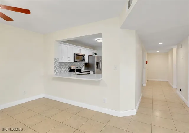 Listing Photo 4 - Condo for sale in building located at 744 Landover Cir, Naples, FL 34104 - Unit #101