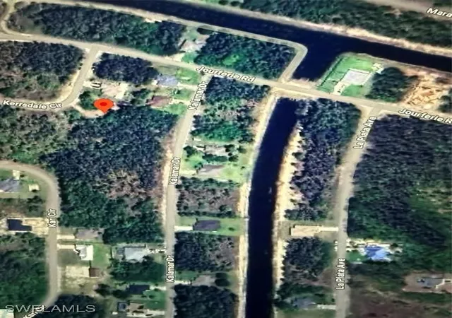 Photo 1 of Land for sale at 318 Kerrsdale Cir, Lehigh Acres, FL 33974 | MLS# 225051583 | Listing updated on 2026-09-16