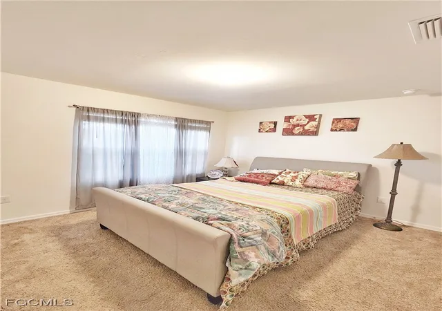 Photo 3 of Single family home for sale at 8330 Tortoise Isle Ct, Lehigh Acres, FL 33972 | MLS# 2025002494 | Listing updated on 2026-09-12