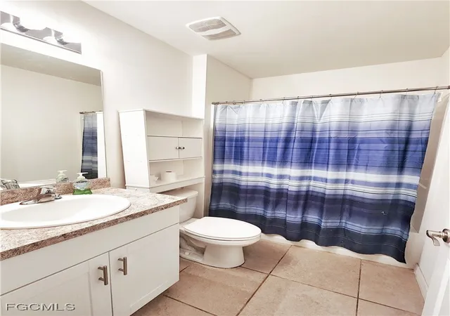 Photo 4 of Single family home for sale at 8330 Tortoise Isle Ct, Lehigh Acres, FL 33972 | MLS# 2025002494 | Listing updated on 2026-09-12