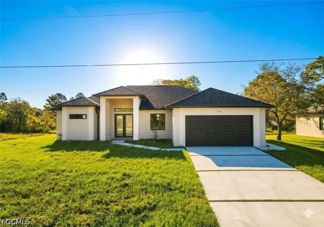 Photo 1 of Single family home for sale at 1102 Greenwood Ave, Lehigh Acres, FL 33972 | MLS# 2025008725 | Listing updated on 2026-09-05