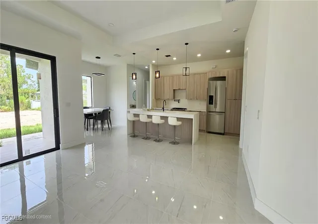Photo 3 of Single family home for sale at 1102 Greenwood Ave, Lehigh Acres, FL 33972 | MLS# 2025008725 | Listing updated on 2026-09-05