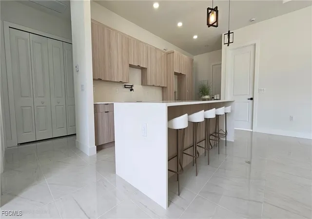 Photo 3 of Single family home for sale at 1102 Greenwood Ave, Lehigh Acres, FL 33972 | MLS# 2025008725 | Listing updated on 2026-09-05