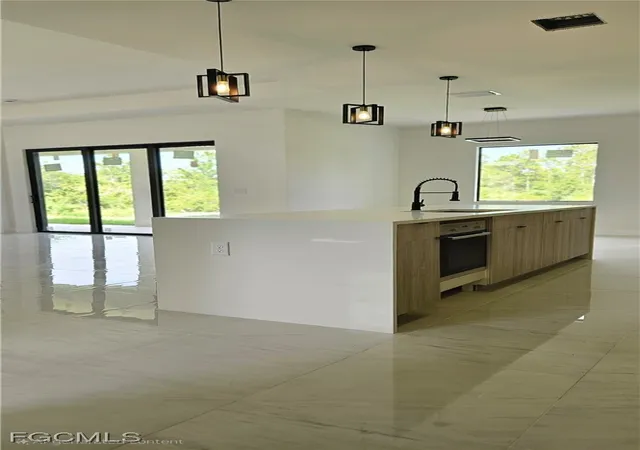 Photo 4 of Single family home for sale at 1102 Greenwood Ave, Lehigh Acres, FL 33972 | MLS# 2025008725 | Listing updated on 2026-09-05