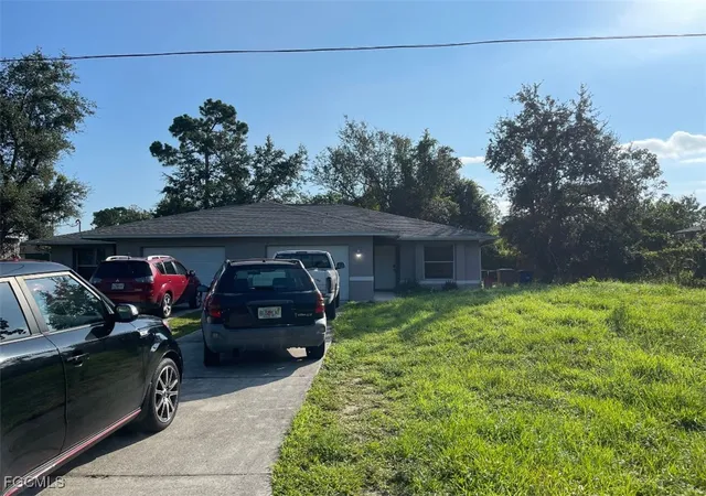 Photo 1 of Multi family home for sale at 123 Meadow Rd, Lehigh Acres, FL 33973 | MLS# 2025009413 | Listing updated on 2026-09-02