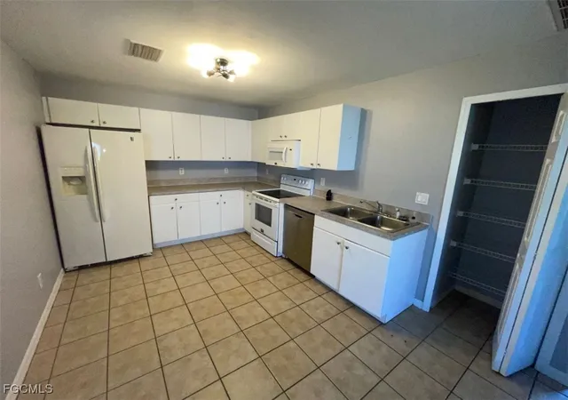 Photo 2 of Multi family home for sale at 123 Meadow Rd, Lehigh Acres, FL 33973 | MLS# 2025009413 | Listing updated on 2026-09-02
