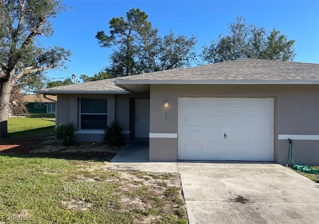 Photo 3 of Multi family home for sale at 123 Meadow Rd, Lehigh Acres, FL 33973 | MLS# 2025009413 | Listing updated on 2026-09-02