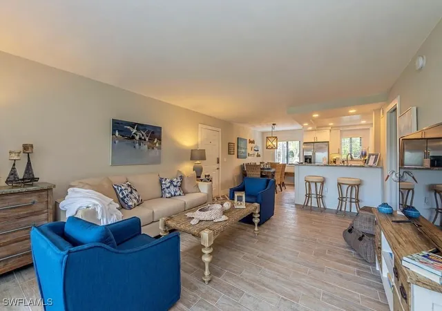 Listing Photo 4 - Condo for sale in building located at 900 Misty Pines Cir, Naples, FL 34105 - Unit #203