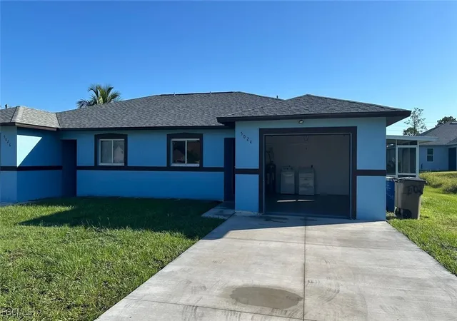 Photo 2 of Multi family home for sale at 5026 24th St Sw, Lehigh Acres, FL 33973 | MLS# 2025011738 | Listing updated on 2026-09-09