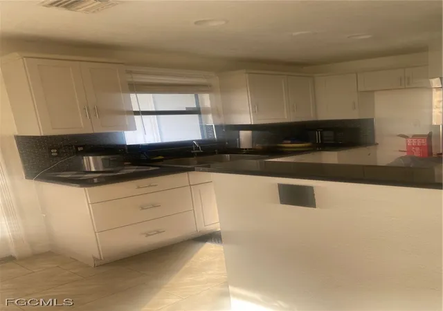 Photo 4 of Single family home for sale at 114 Oleander Rd, Lehigh Acres, FL 33936 | MLS# 2025015274 | Listing updated on 2026-09-14