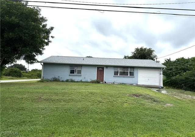 Photo 1 of Single family home for sale at 3301 13th Street Sw, Lehigh Acres, FL 33976 | MLS# 2025017502 | Listing updated on 2026-09-10