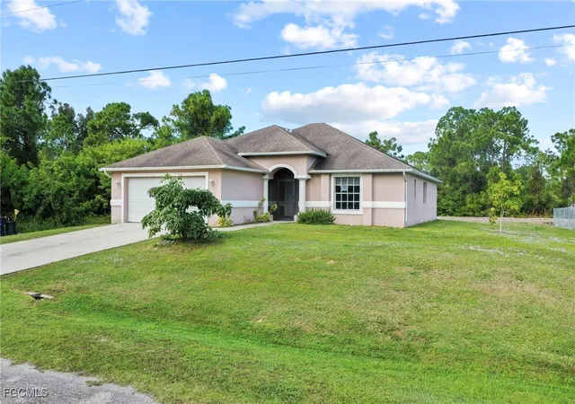 Photo 1 of Single family home for sale at 723 Newell St E, Lehigh Acres, FL 33974 | MLS# 2025018733 | Listing updated on 2026-10-16