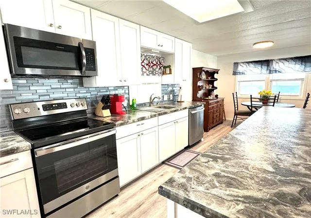 Photo 3 of Manufactured home for sale at 4693 Leilani Ln, Bonita Springs, FL 34134 | MLS# 225078827 | Listing updated on 2026-09-11