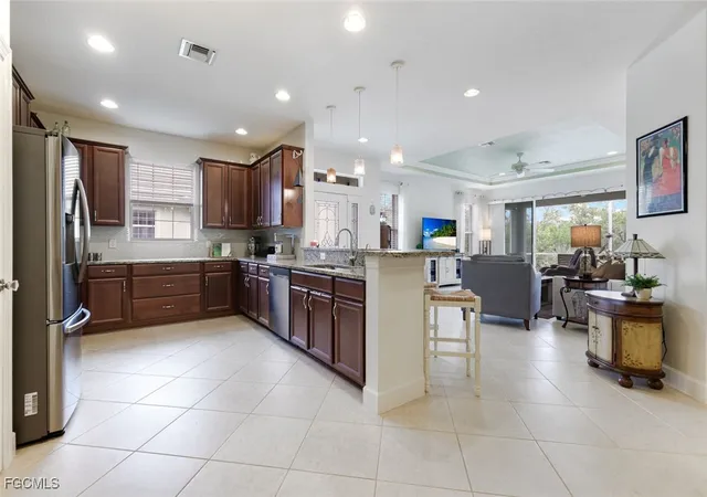 Photo 4 of Townhouse for sale at 10436 Peso Del Rio Dr, Fort Myers, FL 33908 | MLS# 2025019505 | Listing updated on 2026-09-09