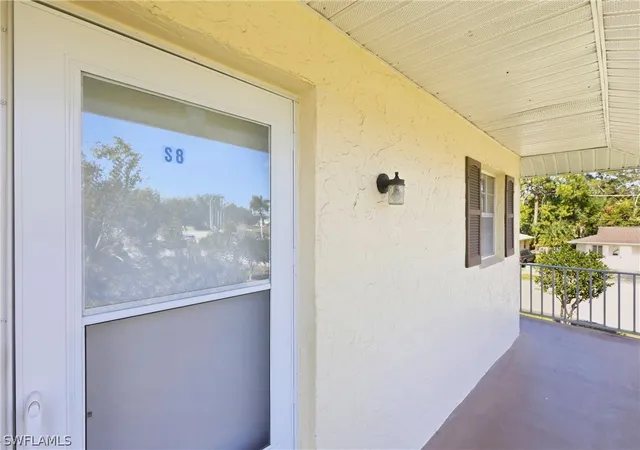 Listing Photo 4 - Condo for sale in building located at 3325 Airport Rd N, Naples, FL 34105 - Unit #S8