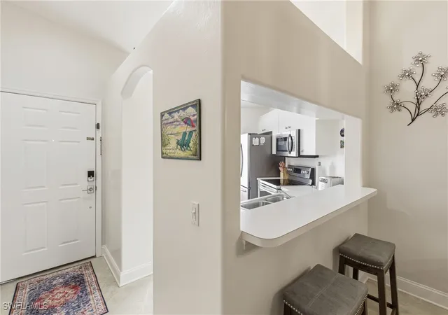Listing Photo 4 - Condo for sale in building located at 1295 Sweetwater Cvs, Naples, FL 34110 - Unit #8203