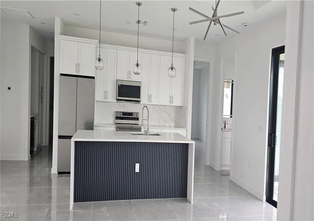Photo 3 of Single family home for sale at 1122 Nw 15th Street, Cape Coral, FL 33993 | MLS# 2025021557 | Listing updated on 2026-09-16