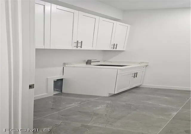 Photo 3 of Single family home for sale at 1122 NW 15th Street, Cape Coral, FL 33993 | MLS# 2025021557 | Listing updated on 2026-09-16