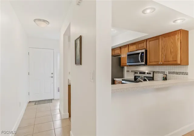 Listing Photo 2 - Condo for sale in building located at 309 Cape Coral Pkwy W, Cape Coral, FL 33914 - Unit #206