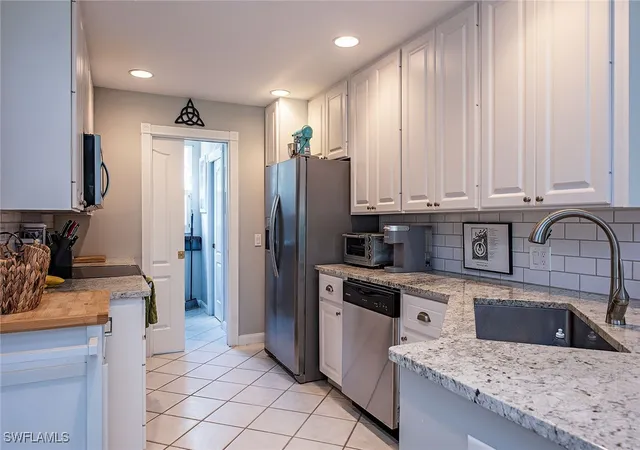 Photo 4 of Townhouse for sale at 5697 Cove Cir #42, Naples, FL 34119 | MLS# 225081905 | Listing updated on 2026-09-13