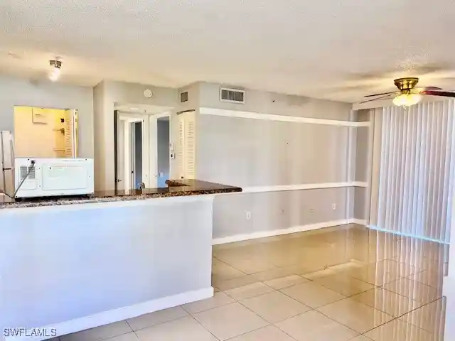 Listing Photo 1 - Condo for sale in 1185 Wildwood Lakes Blvd located at 1185 Wildwood Lakes Blvd, Naples, FL 34104 - Unit #101