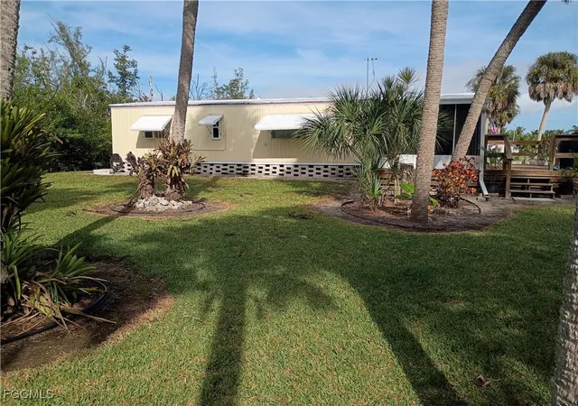 Photo 4 of Manufactured home for sale at 7867 Raymary St, Bokeelia, FL 33922 | MLS# 2025023266 | Listing updated on 2026-09-14