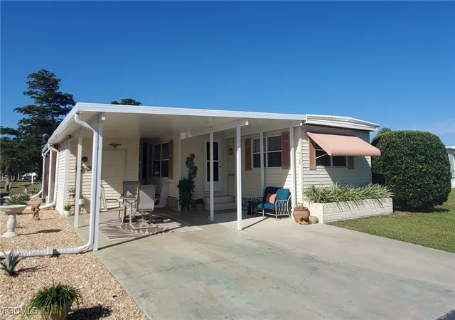 Photo 2 of Manufactured home for sale at 938 Lazy Ln, North Fort Myers, FL 33917 | MLS# 2026002141 | Listing updated on 2026-09-04