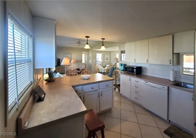 Photo 3 of Manufactured home for sale at 938 Lazy Ln, North Fort Myers, FL 33917 | MLS# 2026002141 | Listing updated on 2026-09-04