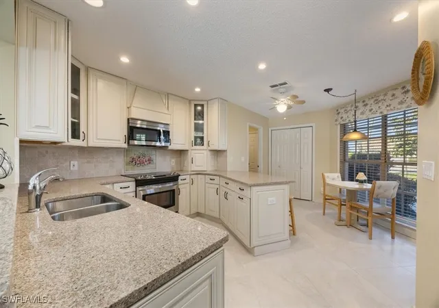 Photo 4 of Single family home for sale at 4198 Royal Wood Blvd, Naples, FL 34112 | MLS# 226001408 | Listing updated on 2026-09-13
