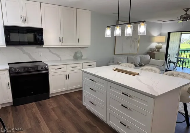 Listing Photo 4 - Condo for sale in building located at 746 Eagle Creek Dr, Naples, FL 34113 - Unit #203