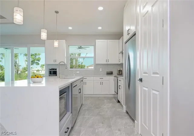 Photo 3 of Single family home for sale at 1202 SW 8th Place, Cape Coral, FL 33991 | MLS# 2026006713 | Listing updated on 2026-09-10