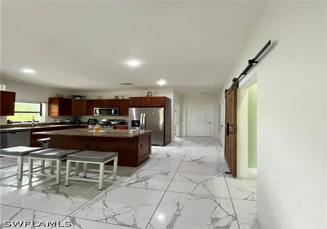 Photo 4 of Single family home for sale at 2363 20th Avenue NE, Naples, FL 34120 | MLS# 226005926 | Listing updated on 2026-09-12