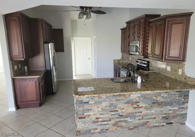 Photo 2 of Sale Pending at 11802 Royal Tee Ct, Cape Coral, FL 33991 | MLS# 2026008902 | Listing updated on 2026-09-10