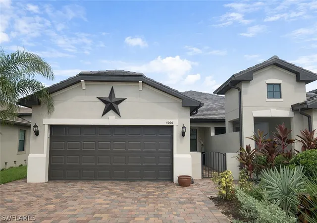 Photo 1 of Townhouse for sale at 7666 Jacaranda Ln, Naples, FL 34114 | MLS# 226008768 | Listing updated on 2026-09-09
