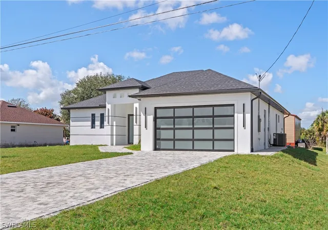 Photo 2 of Single family home for sale at 912 Bell Blvd S, Lehigh Acres, FL 33974 | MLS# 226001469 | Listing updated on 2026-09-13
