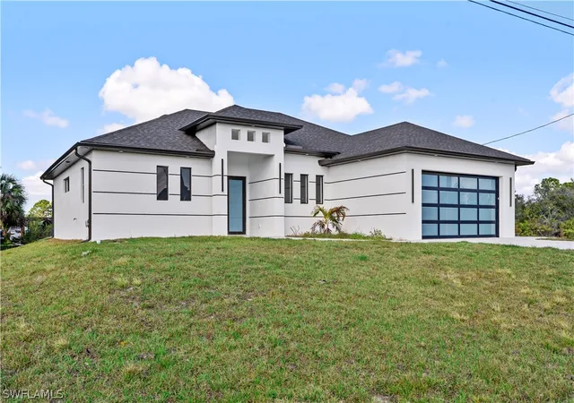 Photo 3 of Single family home for sale at 912 Bell Blvd S, Lehigh Acres, FL 33974 | MLS# 226001469 | Listing updated on 2026-09-13