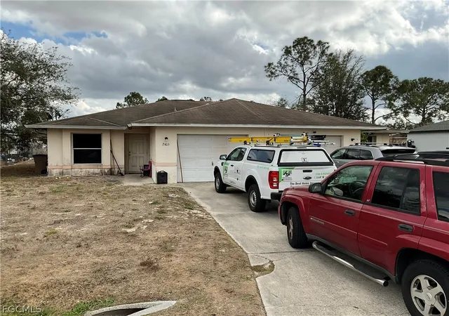 Photo 1 of Multi family home for sale at 2405/2407 Vernon Ave S, Lehigh Acres, FL 33973 | MLS# 2026010600 | Listing updated on 2026-09-04